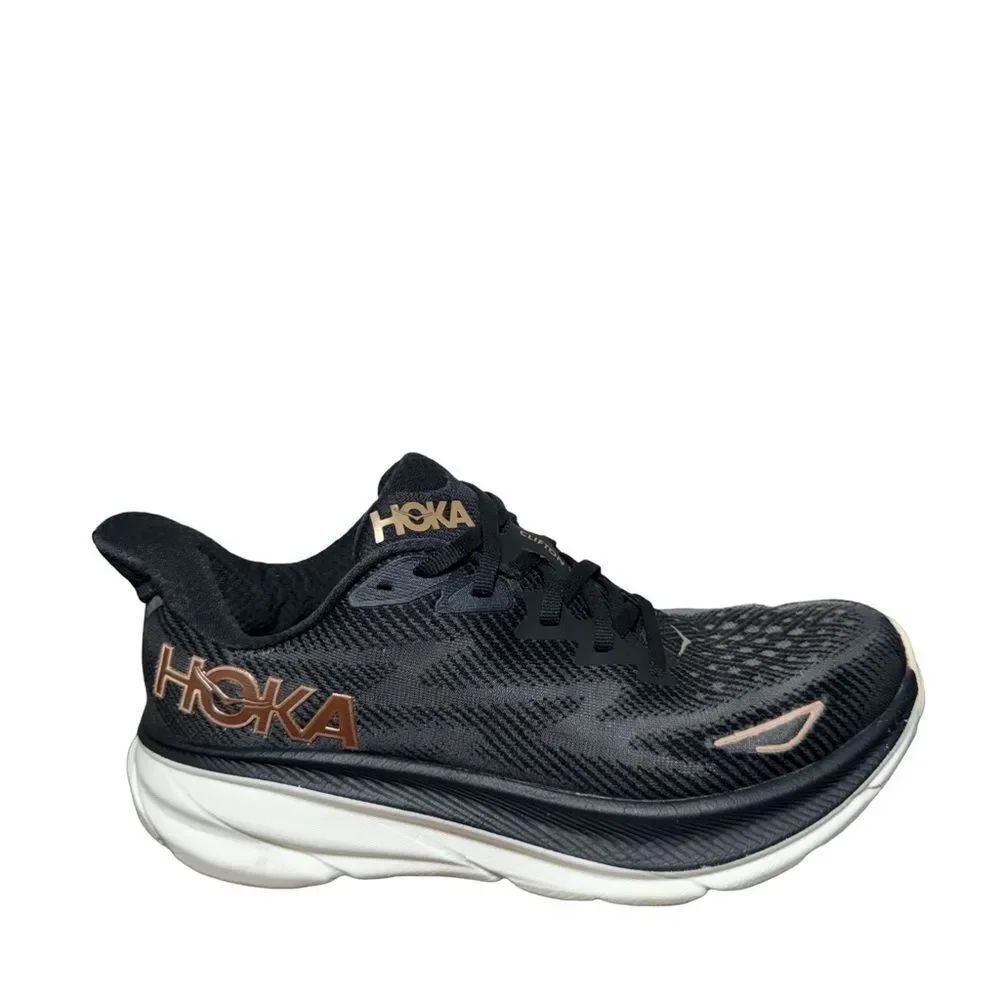 Hoka women’s Clifton 9 Black and Gold Athletic Shoes size 8.5 B